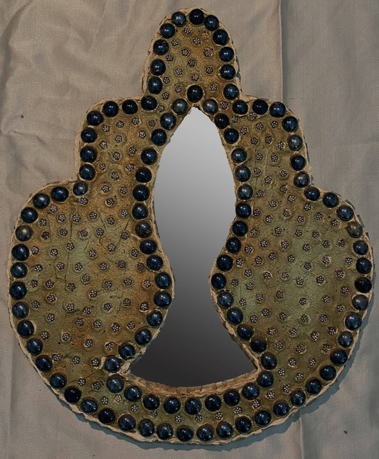 Hamsa mirror in gold