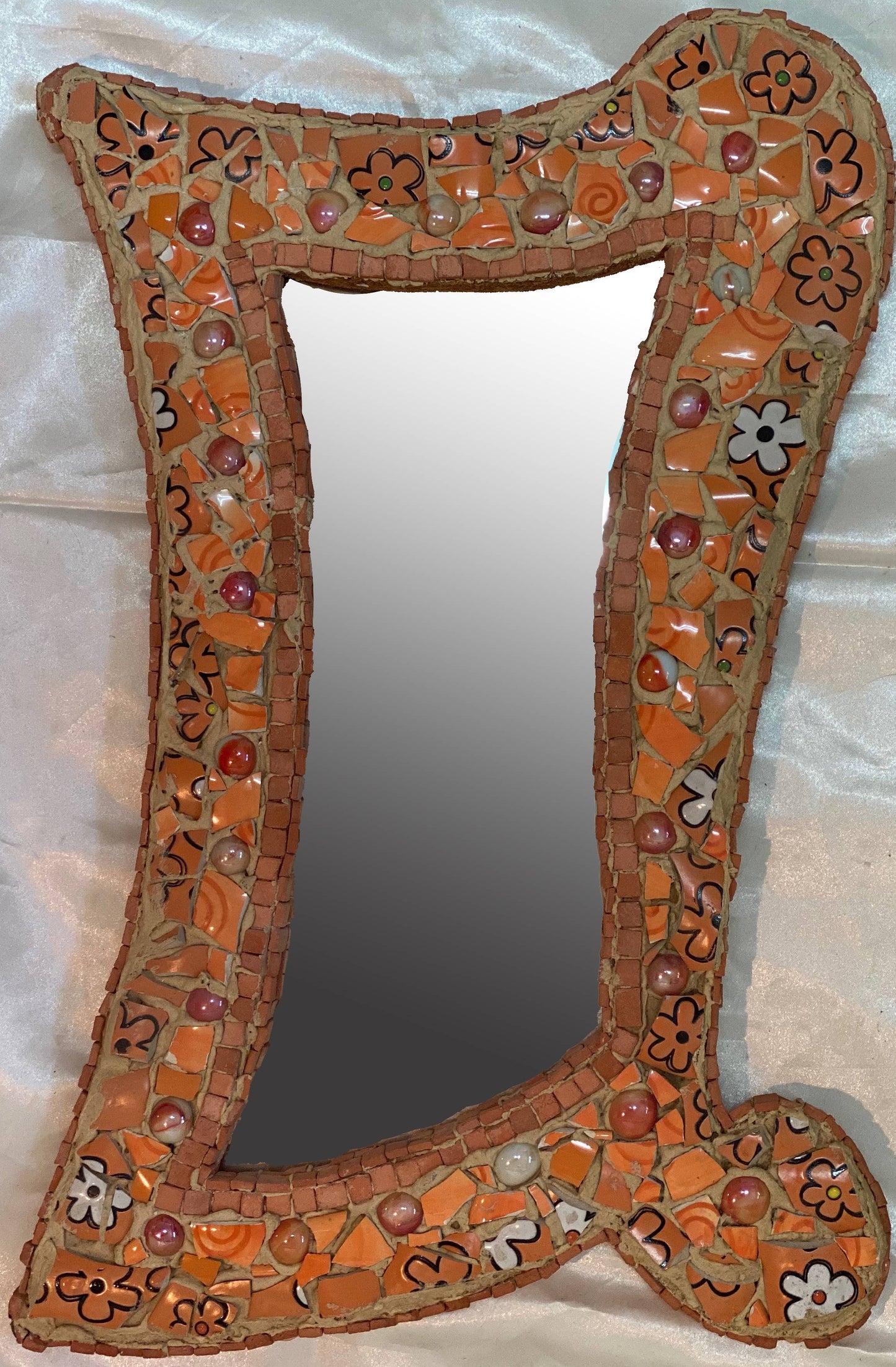 Small mirror in orange