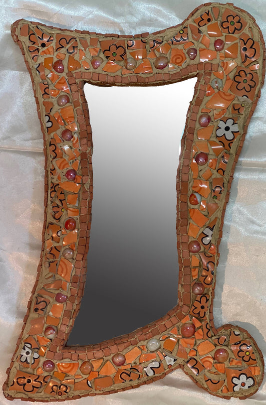 Small mirror in orange