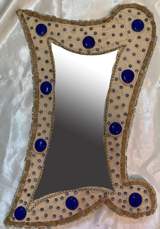 Mirror with blue spark